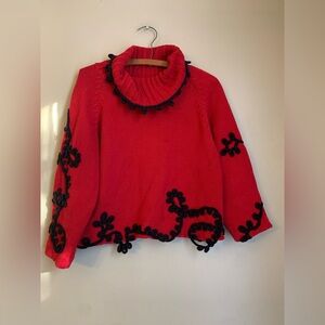 Lisa Nichols red black trim sweater Women's Christmas holiday old money mature